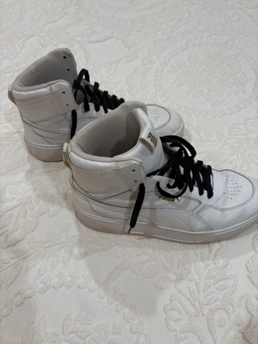 Puma White High-Top Sneakers with Black Laces and Gold Accents